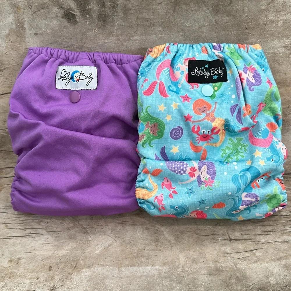Lalabye Baby, one size cloth diapers reusable. Pair, one print one solid. *USED*